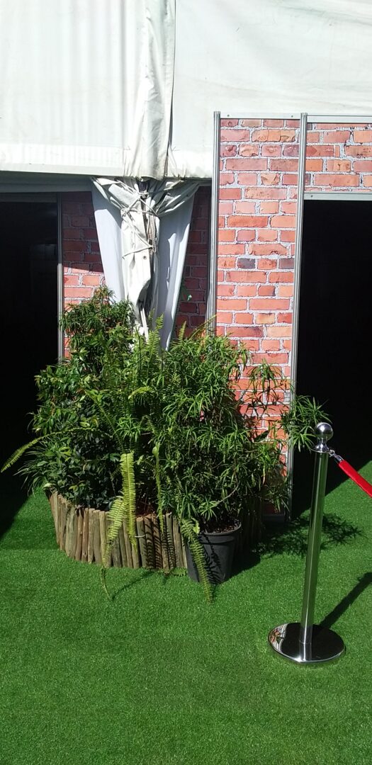 EBS exhibition booth setup inside a large expo hall with lights and banners