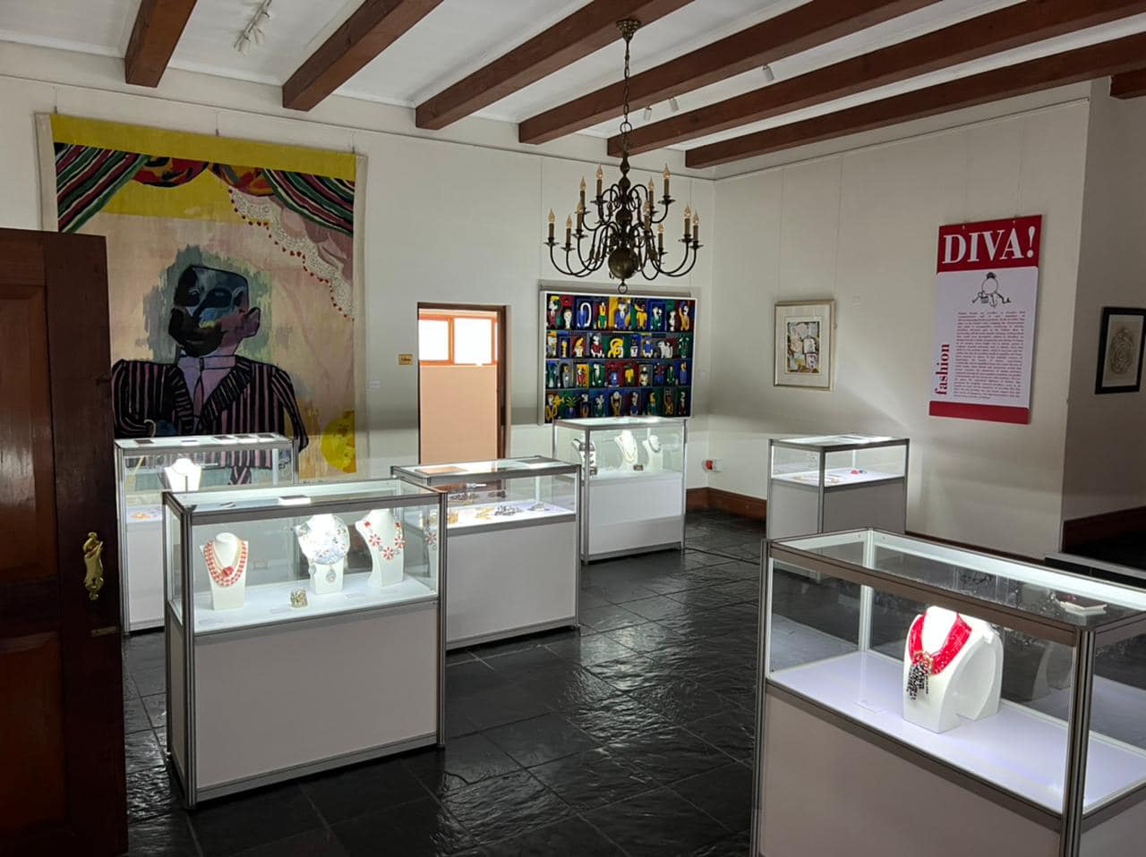 EBS custom-built event stand with flooring, furniture, and lighting setup